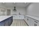 Bright kitchen offers ample counter space, stylish cabinetry, and a modern island at 4155 Winterberry Rd, Cumming, GA 30040