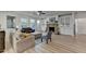 Spacious living room featuring a stone fireplace and lots of natural light at 4155 Winterberry Rd, Cumming, GA 30040