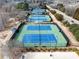 Outdoor tennis courts offering a recreational space for sports and activities in the community at 4155 Winterberry Rd, Cumming, GA 30040