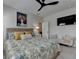 Inviting bedroom featuring a patterned bedspread, light-colored furniture, and neutral walls at 105 Aspen Hall Dr, Canton, GA 30115