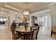 Inviting dining room with hardwood floors, modern lighting, and stylish decor at 105 Aspen Hall Dr, Canton, GA 30115