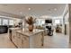 Spacious open layout with an island sink featuring brass fixtures, ideal for entertaining and cooking at 105 Aspen Hall Dr, Canton, GA 30115