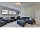 Cozy living room featuring comfortable sofas, natural light, and a relaxing atmosphere at 105 Aspen Hall Dr, Canton, GA 30115