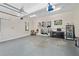 Spacious and well-lit three car garage with ample storage space, and door openers for ease at 18 Rose Gate Ne Dr, Atlanta, GA 30342