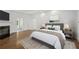 Serene main bedroom with a fireplace, neutral decor, and an ensuite bathroom entrance at 18 Rose Gate Ne Dr, Atlanta, GA 30342