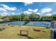 Well-maintained tennis courts with vibrant blue and green surfaces, ideal for recreation at 18 Rose Gate Ne Dr, Atlanta, GA 30342