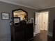 Cozy bedroom featuring a wooden dresser with mirror, neutral walls, and hardwood floors at 213 Mccready Dr, Dallas, GA 30157