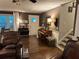 Welcoming foyer with hardwood floors, piano, and an inviting staircase, creating a warm entrance at 213 Mccready Dr, Dallas, GA 30157