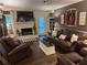 Cozy living room with fireplace, ample seating, and stylish decor, ideal for Gathering gatherings at 213 Mccready Dr, Dallas, GA 30157