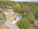 Aerial view of a charming single-Gathering home with a spacious front yard and driveway at 315 Fieldridge Dr, Lawrenceville, GA 30045