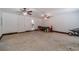 Large bonus room with two ceiling fans, ample space, and ready for your personal touch at 315 Fieldridge Dr, Lawrenceville, GA 30045