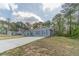 Picturesque single-story home featuring green lawn, blue shutters, and an inviting driveway at 315 Fieldridge Dr, Lawrenceville, GA 30045