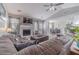 Cozy living room features a fireplace, comfortable seating, and dining area in an open layout at 315 Fieldridge Dr, Lawrenceville, GA 30045