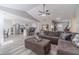 Open-concept living room and kitchen offer modern gray floors and a seamless entertaining space at 315 Fieldridge Dr, Lawrenceville, GA 30045