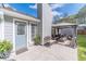 Charming outdoor space with a covered patio, seating, and a back entrance at 315 Fieldridge Dr, Lawrenceville, GA 30045