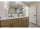 Bathroom featuring double sinks, modern vanity, quartz countertops, and matte black hardware at 3350 Pine Meadow Nw Rd, Atlanta, GA 30327