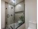 Sleek shower stall with glass surround, tile details, and updated fixtures at 3350 Pine Meadow Nw Rd, Atlanta, GA 30327
