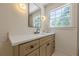 Bright bathroom with modern vanity, sleek black faucet, and stylish light fixtures at 3350 Pine Meadow Nw Rd, Atlanta, GA 30327