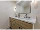 Bathroom featuring double sinks, modern vanity, quartz countertops, and matte black hardware at 3350 Pine Meadow Nw Rd, Atlanta, GA 30327