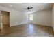 Bright bedroom with hardwood floors, ceiling fan, recessed lighting, and a window at 3350 Pine Meadow Nw Rd, Atlanta, GA 30327