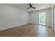 Bedroom with hardwood floors, a window, and closet with sliding doors at 3350 Pine Meadow Nw Rd, Atlanta, GA 30327