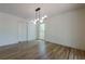 Bright bedroom with a modern lighting fixture at 3350 Pine Meadow Nw Rd, Atlanta, GA 30327
