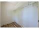 Walk-in closet with hardwood floors and wire shelving for organization at 3350 Pine Meadow Nw Rd, Atlanta, GA 30327