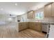 Open-concept kitchen showcasing a large island with countertops and seamless flow into the living space at 3350 Pine Meadow Nw Rd, Atlanta, GA 30327