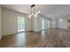 Spacious living area with large windows and hardwood flooring at 3350 Pine Meadow Nw Rd, Atlanta, GA 30327