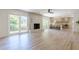 Open floor plan with a living room, fireplace and kitchen at 3350 Pine Meadow Nw Rd, Atlanta, GA 30327