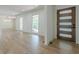 Spacious living room featuring an abundance of natural light and sleek hardwood floors at 3350 Pine Meadow Nw Rd, Atlanta, GA 30327