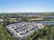 An aerial view showing a residential community with green spaces and a city skyline in the distance at 2071 Westside Blvd, Atlanta, GA 30318