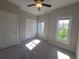 Comfortable bedroom with carpet, ceiling fan and natural light at 2071 Westside Blvd, Atlanta, GA 30318