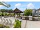 Outdoor cooking and picnic area featuring grills, seating, and lush landscaping for entertaining at 2071 Westside Blvd, Atlanta, GA 30318