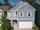 Charming blue two-story home featuring a two-car garage and inviting front porch at 2071 Westside Blvd, Atlanta, GA 30318