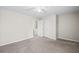 Bright bedroom with carpet, ceiling fan and access to hallway and closets at 2602 Avery Park Cir, Atlanta, GA 30360