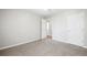 Clean and bright carpeted bedroom with a ceiling fan, perfect for relaxation at 2602 Avery Park Cir, Atlanta, GA 30360