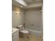 Cozy bathroom featuring a shower-tub combination with white tile surround at 3071 Colonial Way # K, Atlanta, GA 30341