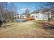 The backyard features an elevated deck, a basketball court, an above-ground pool, and green space at 161 Hunters Chase, Mcdonough, GA 30253