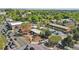 Aerial view of commercial buildings near road with parking and many trees at 171 Riverview Trl, Roswell, GA 30075