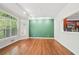 Dining room with hardwood floors and large windows offers ample natural light at 171 Riverview Trl, Roswell, GA 30075