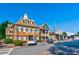 Commercial building with charming brick facade, well manicured landscape, and ample parking at 171 Riverview Trl, Roswell, GA 30075