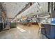 Open interior with seating, food vendors, and high ceilings with natural light at 171 Riverview Trl, Roswell, GA 30075