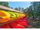 Colorful kayaks neatly stacked, providing residents with opportunities for water activities and outdoor recreation at 171 Riverview Trl, Roswell, GA 30075