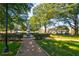 Beautiful park view featuring lush green grass, mature trees, walking paths, and a gazebo at 171 Riverview Trl, Roswell, GA 30075