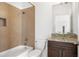 Bathroom featuring granite counters, tiled backsplash, tub-shower, and glass vessel sink at 360 Beracah Sw Trl, Atlanta, GA 30331