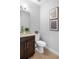 Cozy half bath features a vessel sink and decorative wall art at 360 Beracah Sw Trl, Atlanta, GA 30331