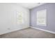 Neutral bedroom with natural light from two windows at 360 Beracah Sw Trl, Atlanta, GA 30331