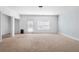 Bedroom with natural light from window and access door to backyard at 360 Beracah Sw Trl, Atlanta, GA 30331