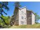 Beautiful multi-story home with mixed siding, including brick and siding, with lush green surroundings at 360 Beracah Sw Trl, Atlanta, GA 30331